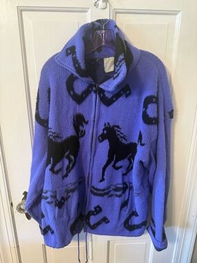 Vintage wool jacket featuring a running horse and horseshoe pattern.